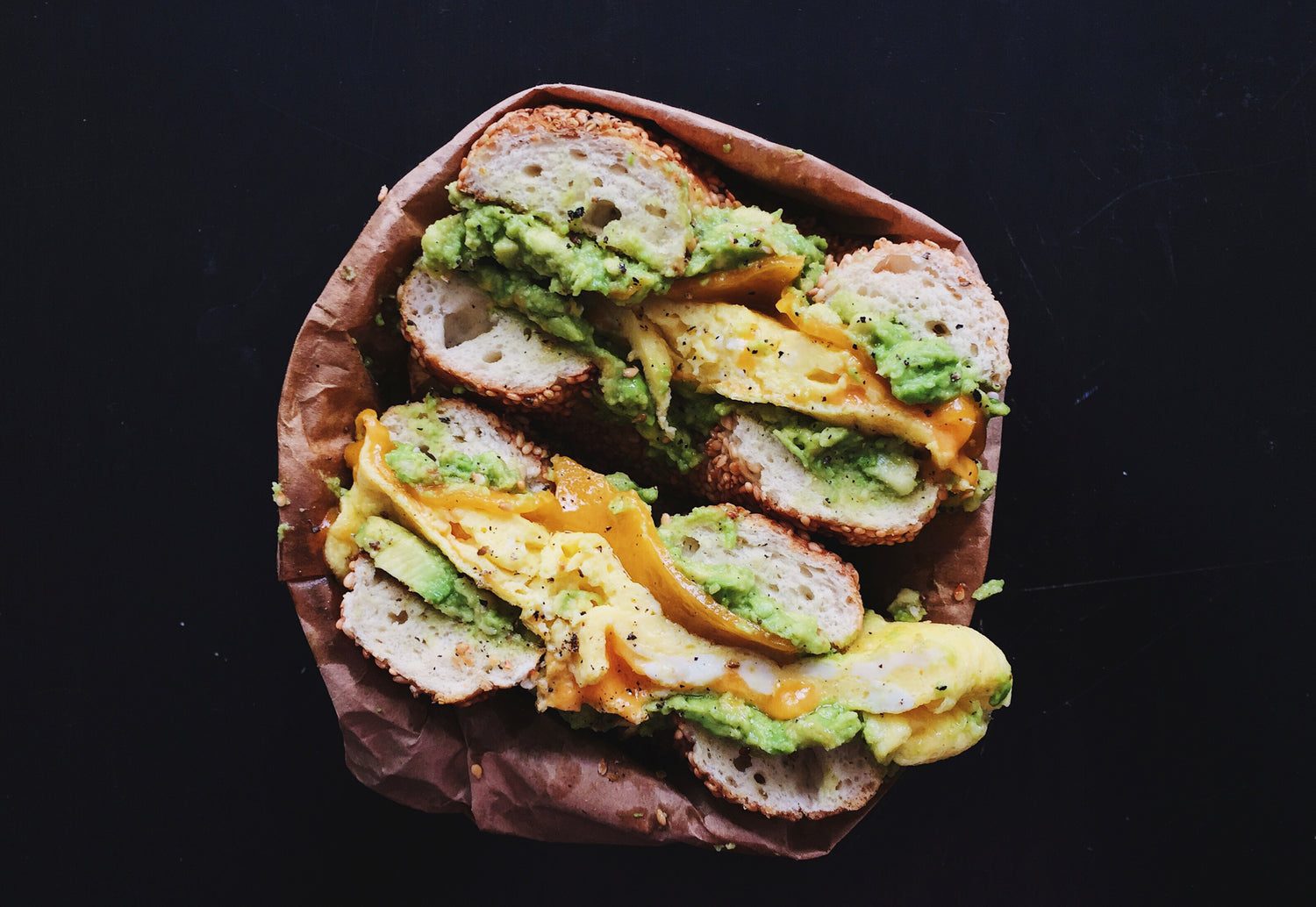Breakfast Bagel with Guacamole and Jalapeno Hot Sauce